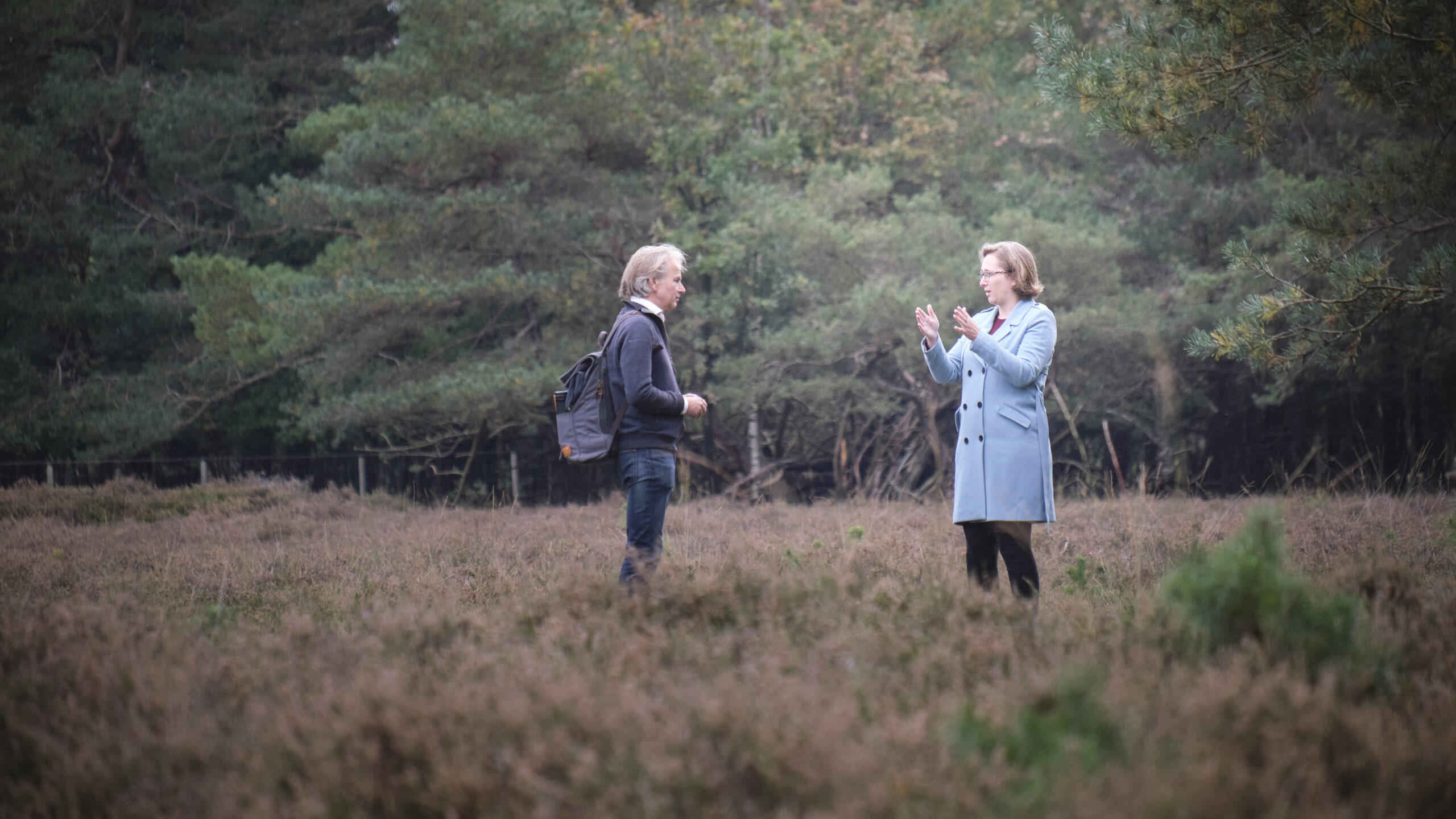 Frans Sandbergen met cliënt op heide