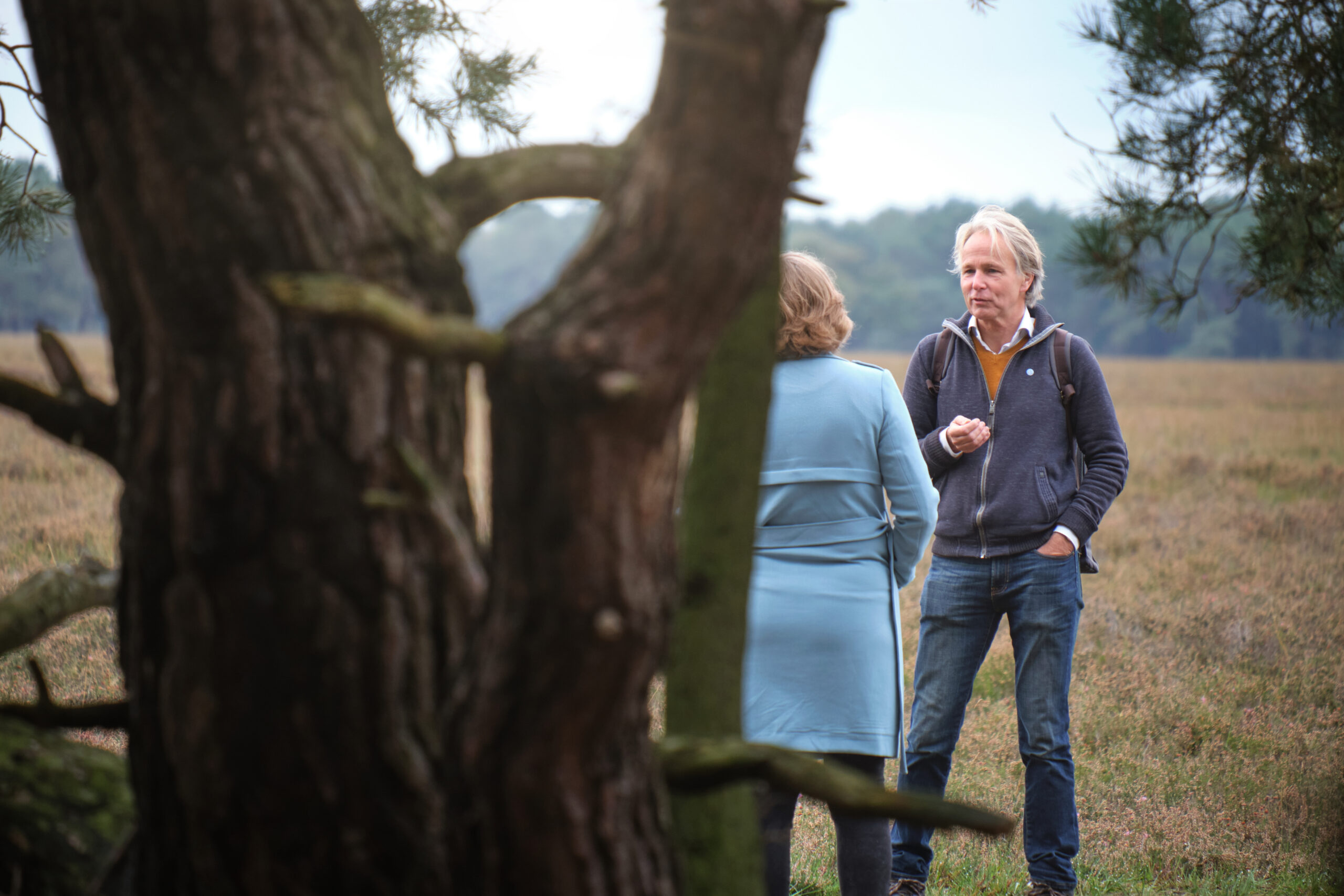 Frans Sandbergen met cliënt op heide